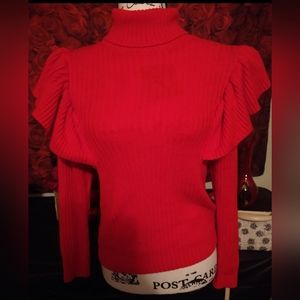 Gorgeous red crop sweater with ruffles on shoulders.